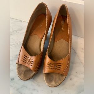 Michael Kors brown leather wedge sandals.